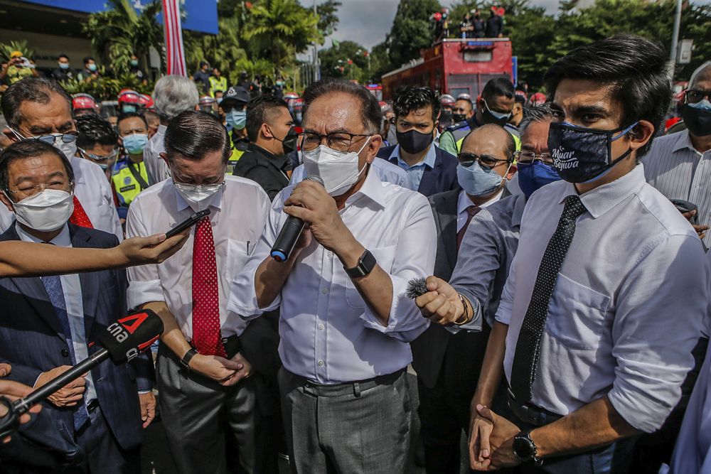 Port Dickson MP Datuk Seri Anwar Ibrahim addresses members of the media after Federal Reserve Unit personnel halted Opposition MPs' march to the Parliament building in Kuala Lumpur August 2, 2021. u00e2u20acu201d Picture by Hari Anggara