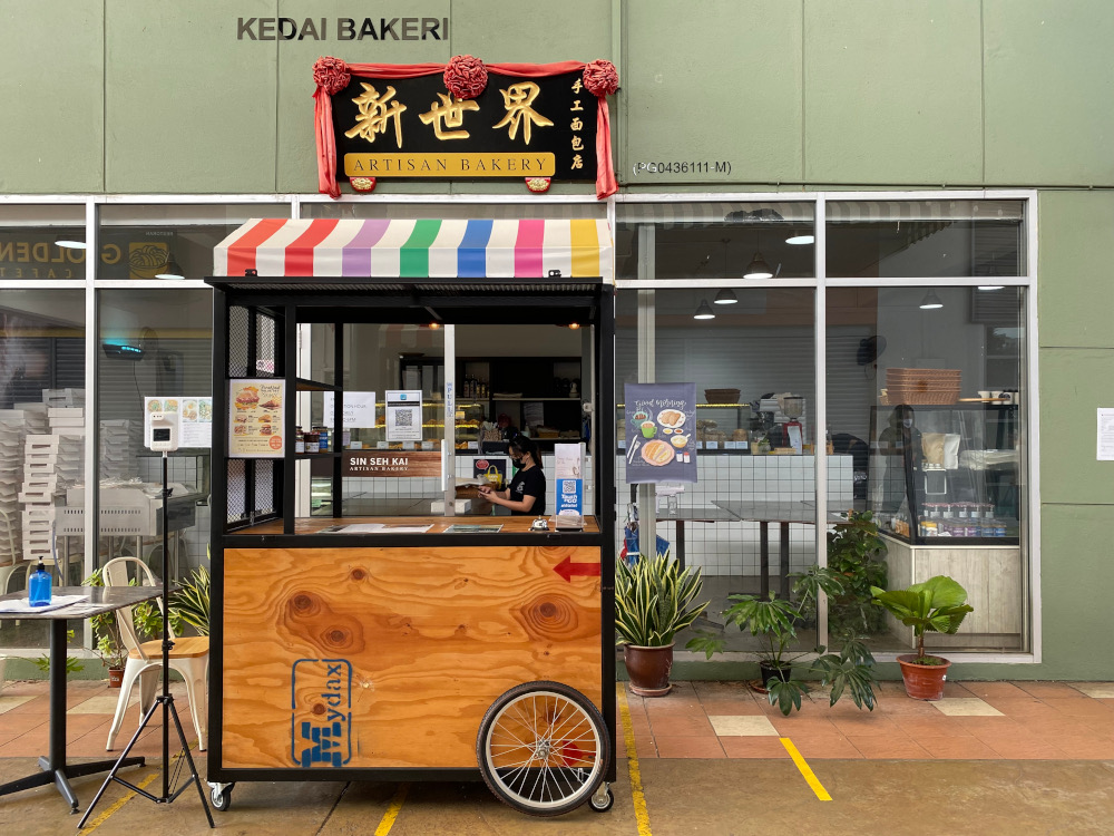 Sin Seh Kai Artisan bakery cafe blocking their entrance as they are not open for dine in at the moment. ― Picture by Steven Ooi KE