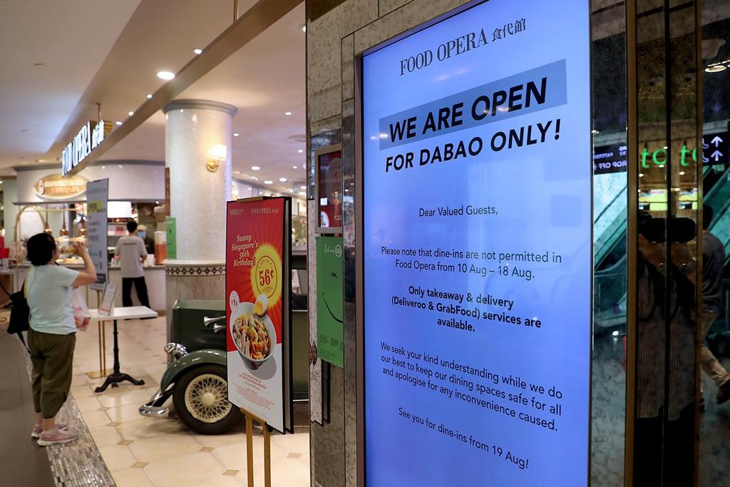 The Food Opera food court at the Ion Orchard shopping mall remain open only for takeaway and delivery services for now. u00e2u20acu2022 TODAY pic