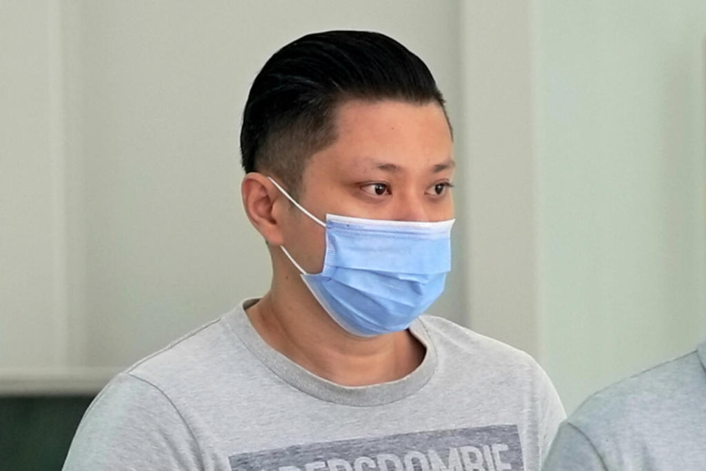 Sim Meng Keat (left) at the State Courts on Aug 3, 2021. u00e2u20acu201d TODAY pic