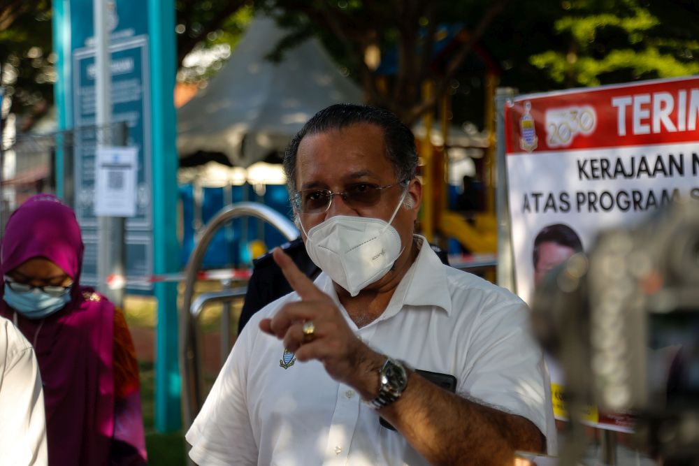 Penang state exco Jagdeep Singh Deo speaks to members of the media during a mass screening exercise in Taman Manggis, George Town August 12, 2021. u00e2u20acu201d Picture by Sayuti Zainudin