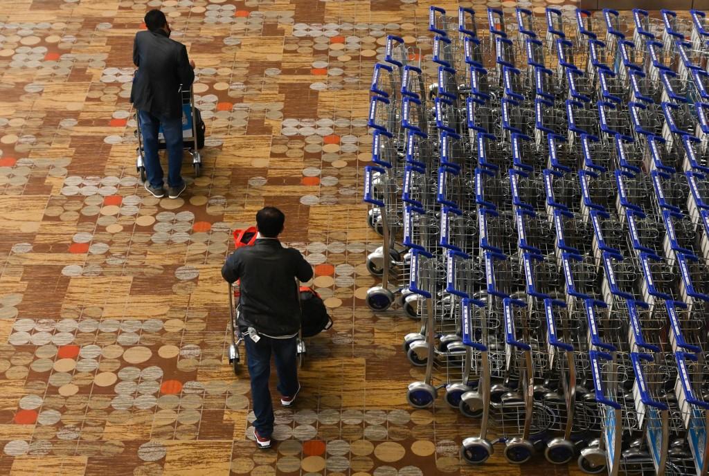 Among the travellers issued with Air Travel Passes, 19 are expected to arrive from Hong Kong on August 26, while two others from Macau will enter Singapore on August 28, 2021. u00e2u20acu2022 AFP pic