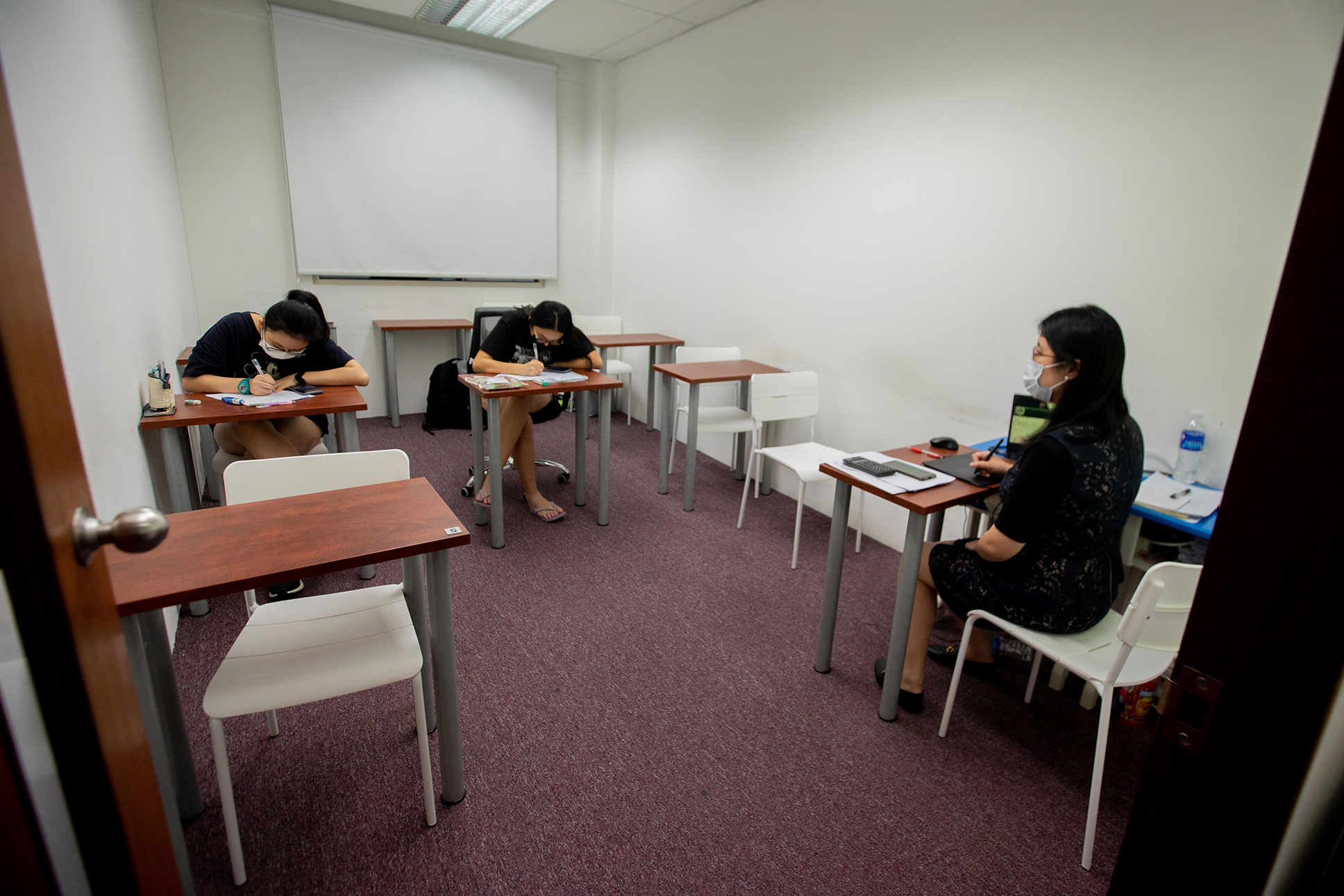 A tuition class in session at Future Academy on Aug 13, 2021. Several experts and industry players said that implementing measures similar to China’s in Singapore, to reduce parents’ reliance on tuition, would be counterproductive.