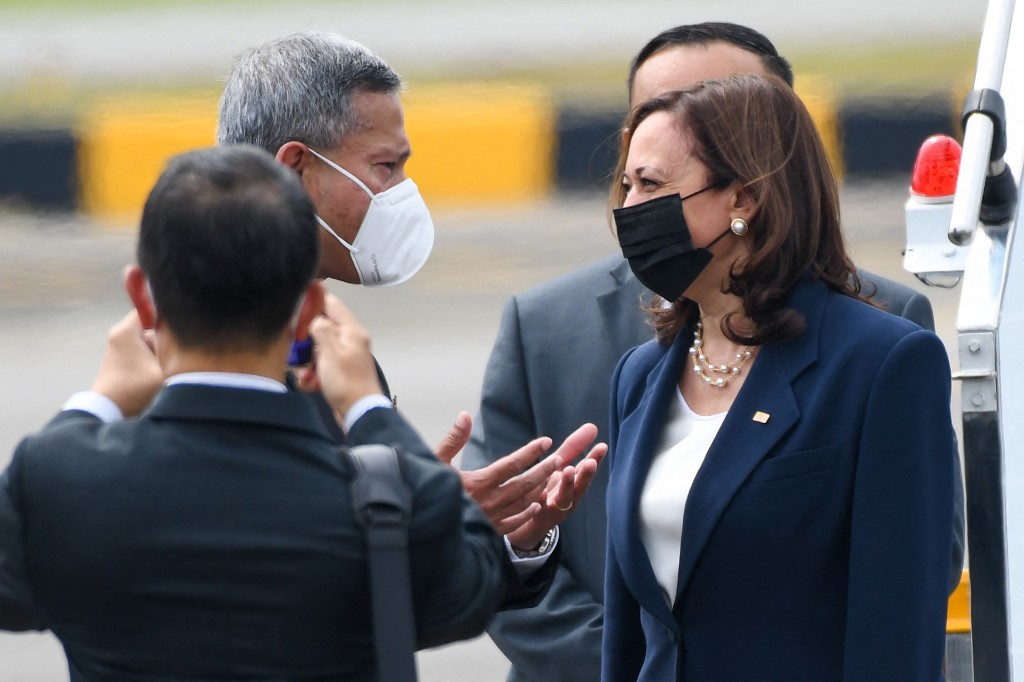 US Vice President Kamala Harris (right) is greeted by Singapore Foreign Minister Vivian Balakrishnan (left) upon her arrival at Paya Lebar Base airport in Singapore on August 22, 2021. u00e2u20acu201d AFP pic