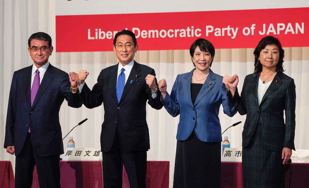 Contenders for the presidential election of the ruling Liberal Democratic Party (LDP) pose prior to a joint news conference at the party's headquarters in Tokyo, Japan 17 September 2021. u00e2u20acu201d Kimimasa Mayama/Pool via Reuters