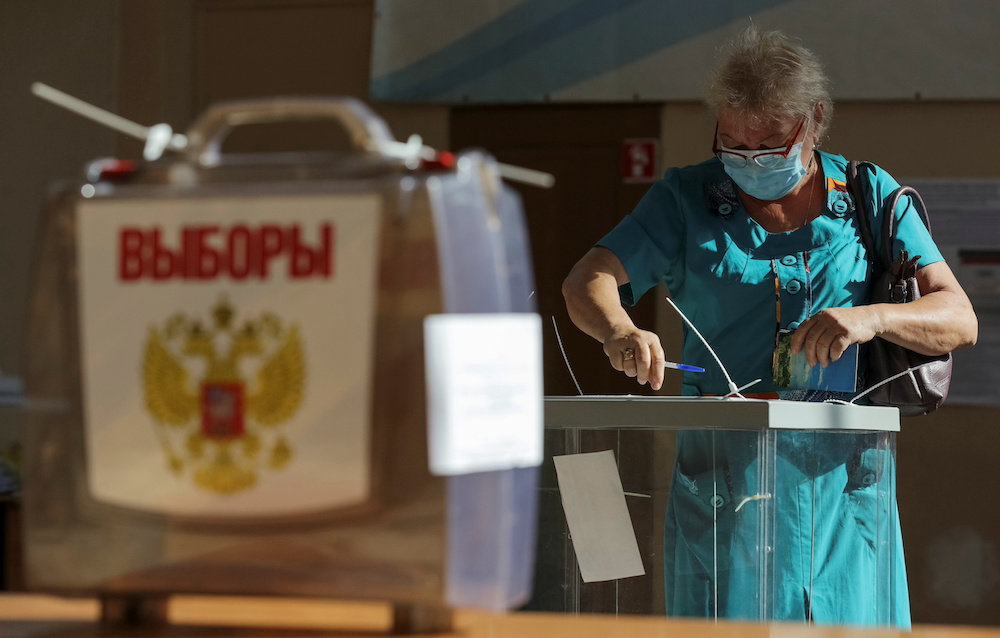 A woman casts a ballot at the last day of a three-day long parliamentary elections in the far eastern city of Vladivostok, Russia September 19, 2021. u00e2u20acu201d Reuters pic