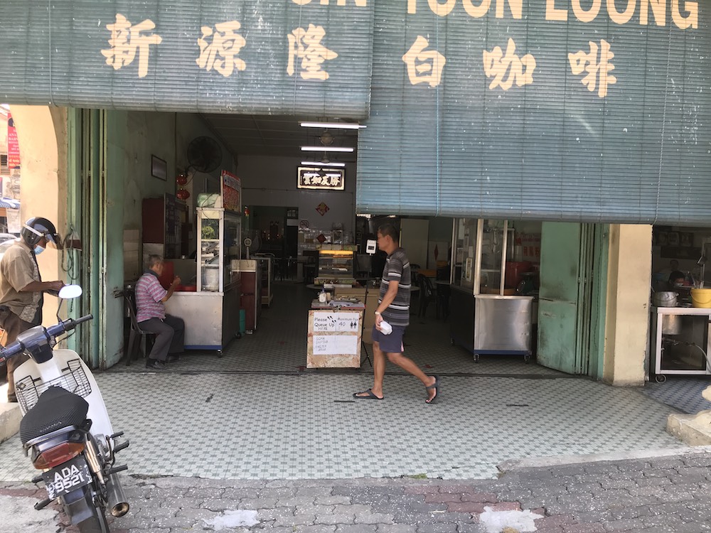 Kedai Kopi Sin Yoon Loong's business suffered because of the pandemic as even regulars came by less often. u00e2u20acu201d Picture by John Bunyan