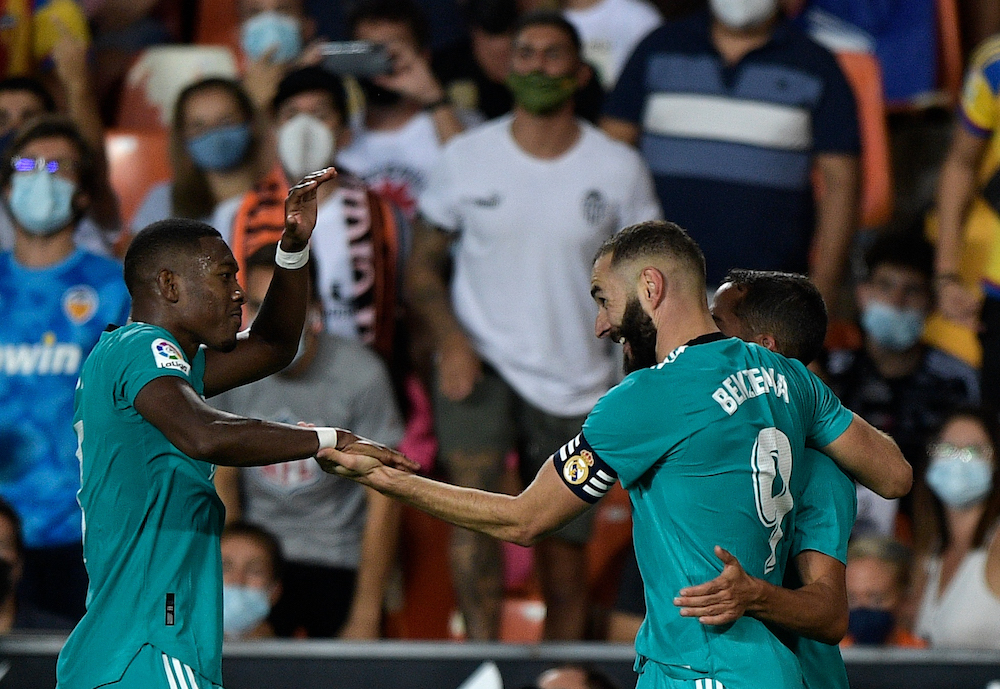 Real Madrid's Karim Benzema celebrates scoring their second goal against Valencia, September 20, 2021. u00e2u20acu201d Reuters pic 