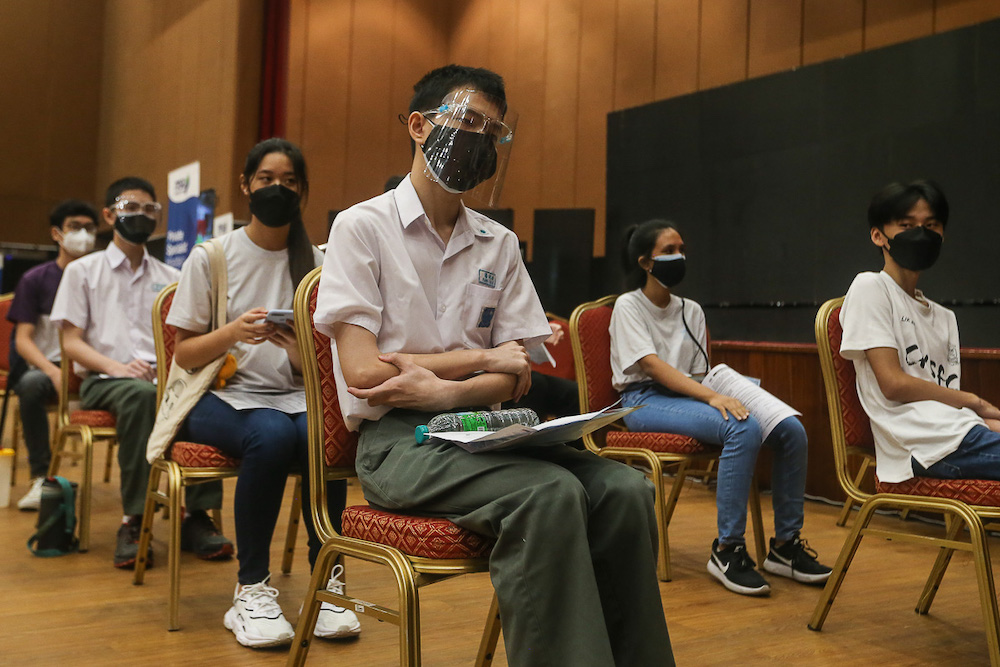 Students wait to get their Covid-19 vaccination at the MSU Medical Centre in Shah Alam September 20, 2021. u00e2u20acu201d Picture by Yusof Mat Isa
