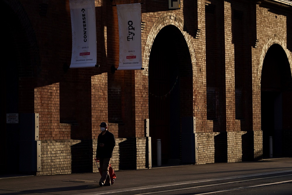 A man wearing a protective face mask walks past a usually busy market in the city centre during a lockdown to curb the spread of a coronavirus disease (Covid-19) outbreak in Sydney August 31, 2021. u00e2u20acu201d Reuters pic