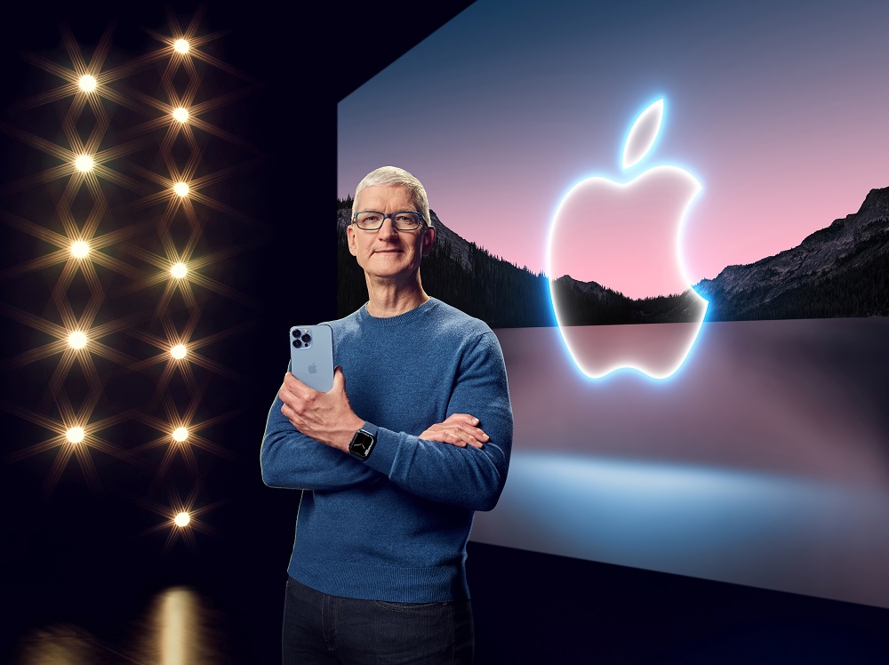 Apple CEO Tim Cook holds the iPhone 13 Pro Max and Apple Watch Series 7 during a special event at Apple Park in Cupertino, California broadcast September 14, 2021. u00e2u20acu201d Handout by Apple Inc via Reuters