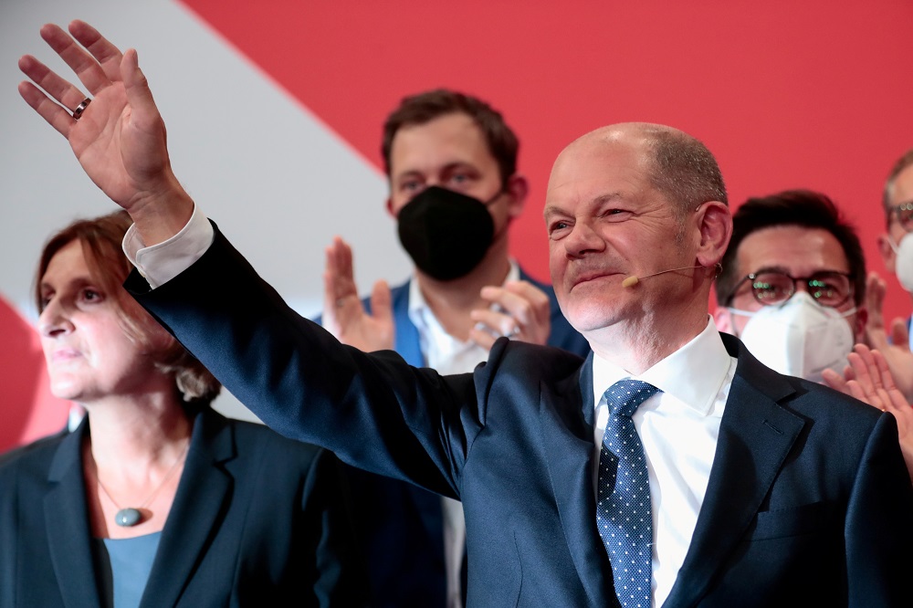 Social Democratic Party (SPD) top candidate for chancellor Olaf Scholz waves after first exit polls for the general elections in Berlin September 26, 2021. u00e2u20acu201d Reuters pic