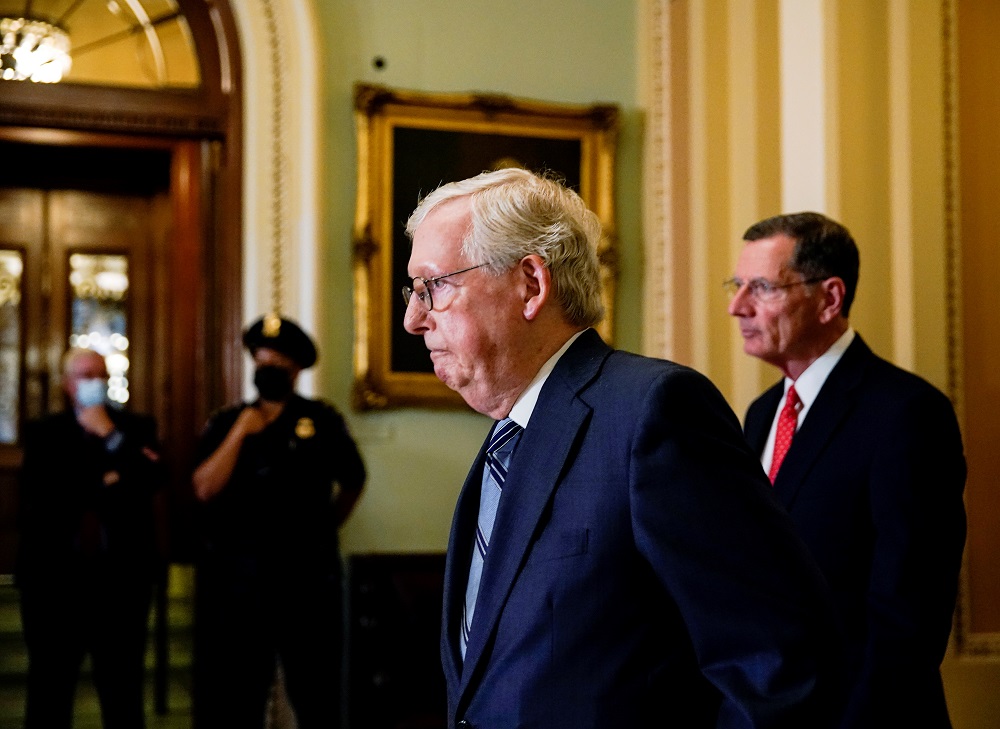US Senate Republican Leader Mitch McConnell is followed by Senator John Barrasso prior to the Senate Republicans weekly policy lunch at the US Capitol in Washington, US September 28, 2021. u00e2u20acu201d Reuters pic