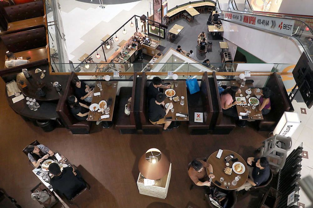 Eateries that are unable to ensure that all dine-in patrons meet the criteria for full Covid-19 vaccination may only operate take-away and delivery services. u00e2u20acu201d Nuria Ling/TODAY pic