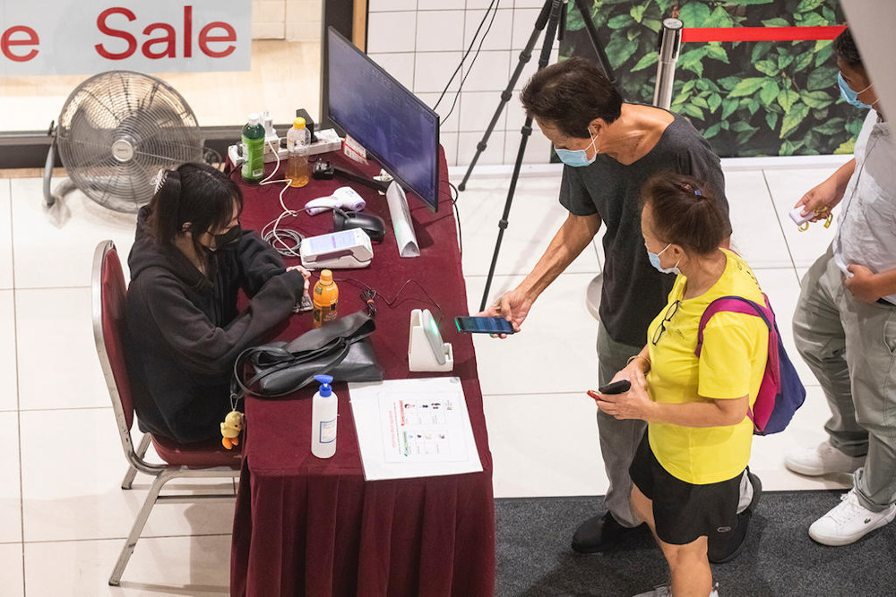 The SafeEntry and TraceTogether contact-tracing systems will be used to inform individuals of recent confirmed close contacts to infected persons or recent exposure to an area of increased spread through health risk alerts and warnings. u00e2u20acu201d Nuria Ling/TOD