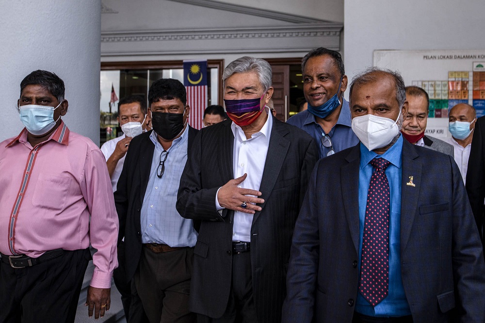 Former deputy prime minister Datuk Seri Ahmad Zahid Hamidi (centre) at the Kuala Lumpur Court Complex September 7, 2021. u00e2u20acu201d Picture by Firdaus Latif
