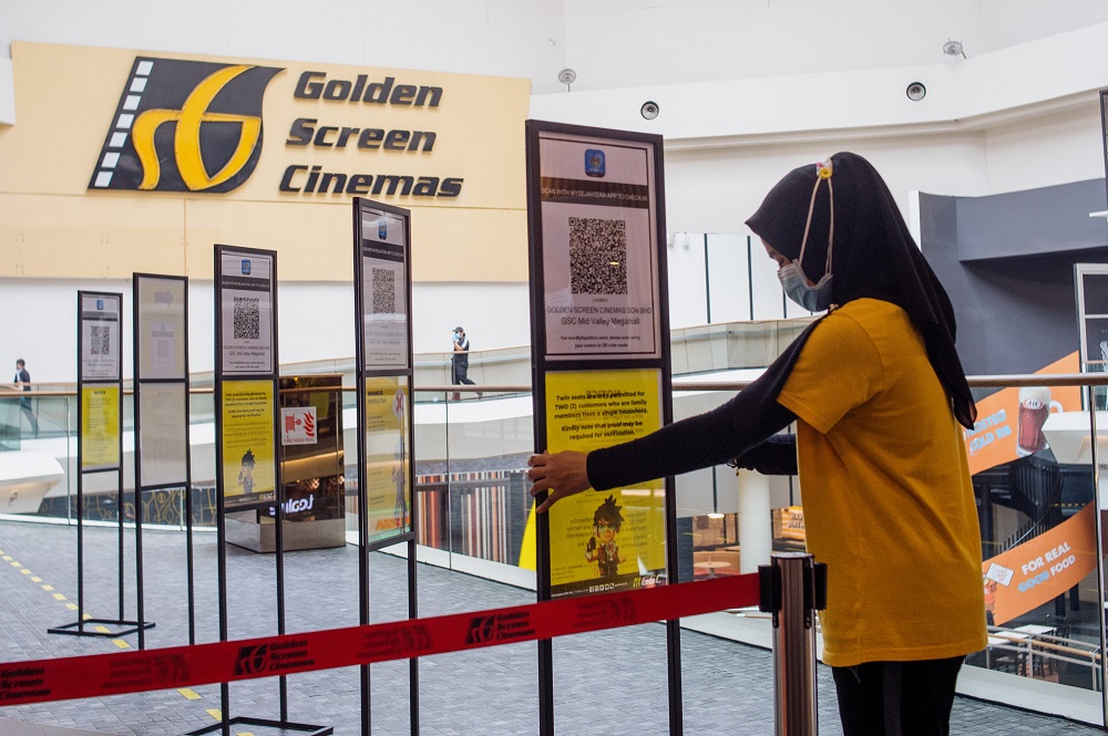 GSC Cinema staff prepare for reopening at the Mid Valley Megamall outlet in Kuala Lumpur September 8, 2021. u00e2u20acu201d Picture by Shafwan Zaidon