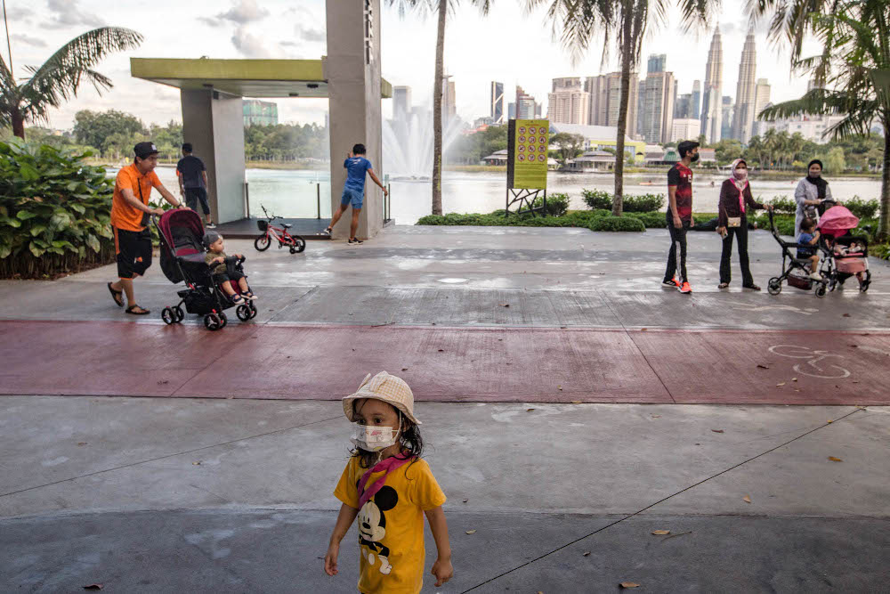 People are taking a walk at Taman Tasik Titiwangsa during Phase Two of the National Recovery Plan in Kuala Lumpur September 10, 2021. u00e2u20acu201d Picture by Firdaus Latif