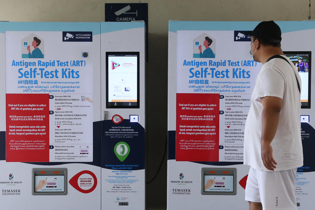 Two vending machines dispensing antigen rapid test kits at Blk 363 Woodlands Ave 5 on Sept 19, 2021. u00e2u20acu201d TODAY pic