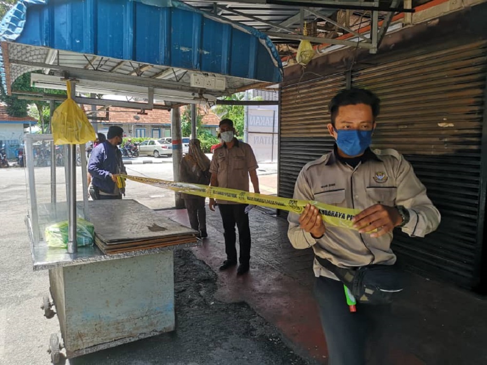 The authorities sealed off the Pulau Tikus market today after it was ordered to close from today onwards. u00e2u20acu201d Picture courtesy of MBPP
