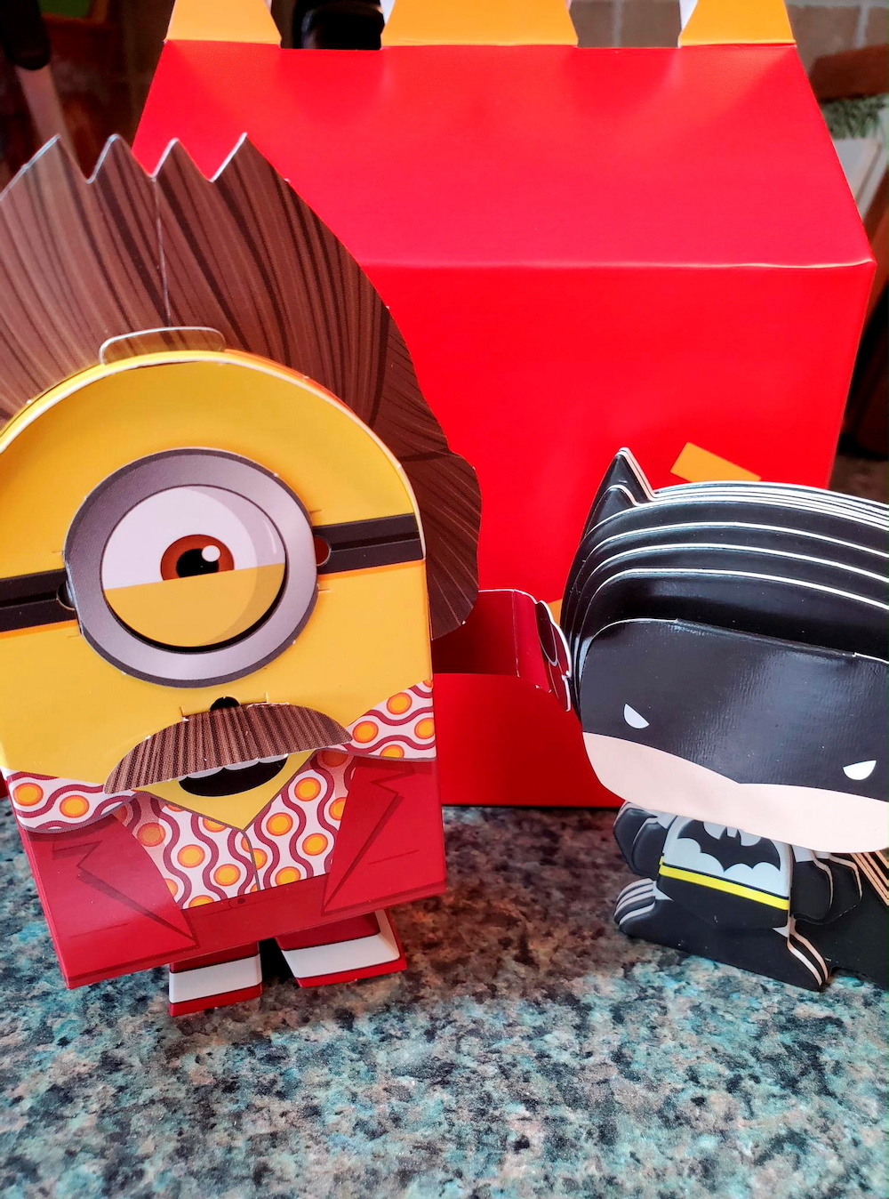 Batman and Minions toys made from paper and cardboard that children assemble themselves are seen, as McDonald's makes its future Happy Meal toys for kids more sustainable, in New York September 20, 2021. u00e2u20acu201d Reuters pic
