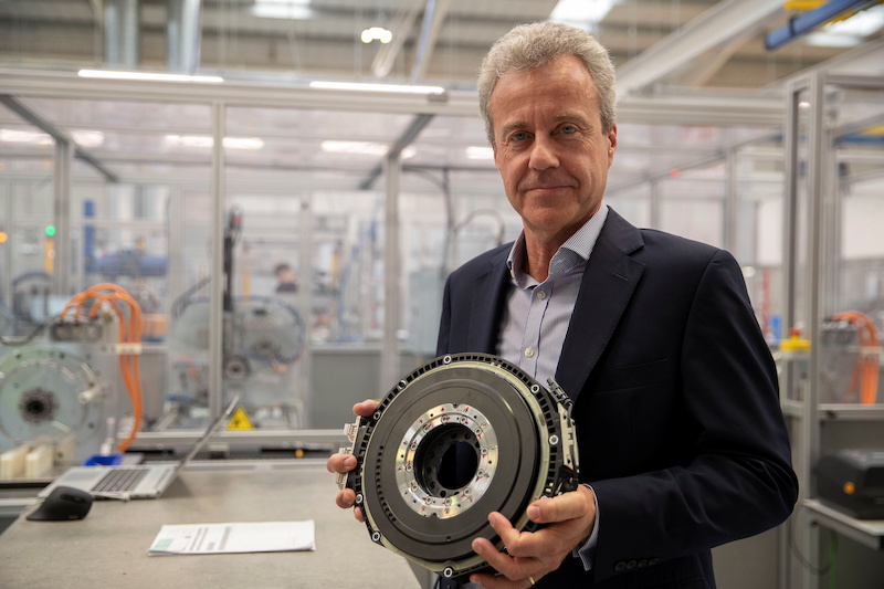 Chris Harris, a CEO of YASA, holds a 24kg (53lbs) axial-flux electric motor for a high-performance electric car as he poses for a photo at the company's headquarters and production facility in Oxford, Britain August 24, 2021. — Reuters pic