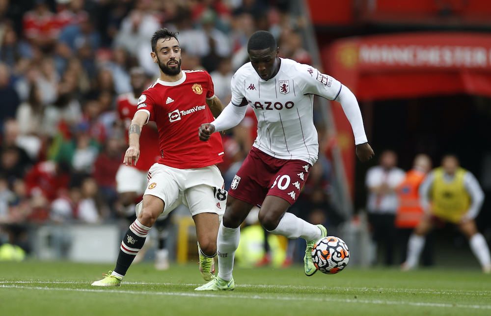 Aston Villau00e2u20acu2122s Kortney Hause in action with Manchester Unitedu00e2u20acu2122s Bruno Fernandes during the match at the Old Trafford in Manchester, September 25, 2021. u00e2u20acu201d Reuters picnn