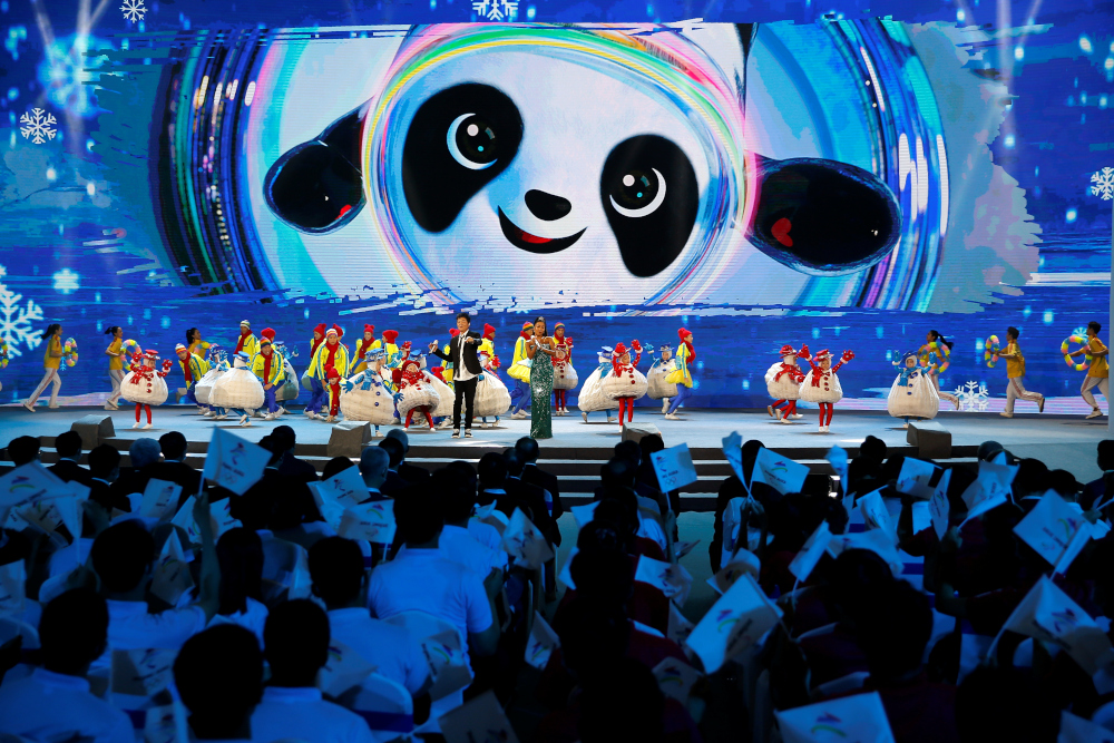 Singers perform on stage at a ceremony unveiling the slogan for Beijing 2022 Winter Olympics, in Beijing, China September 17, 2021. u00e2u20acu201d Reuters pic 