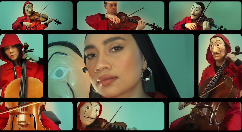 Local singer, Yuna along with the Malaysian Philharmonic Orchestra has collaborated to perform the iconic u00e2u20acu02dcBella Ciaou00e2u20acu2122 song from the anticipated Netflix's show, u00e2u20acu02dcMoney Heistu00e2u20acu2122. u00e2u20acu2022 Screenshot from Facebook/ Netflix MY