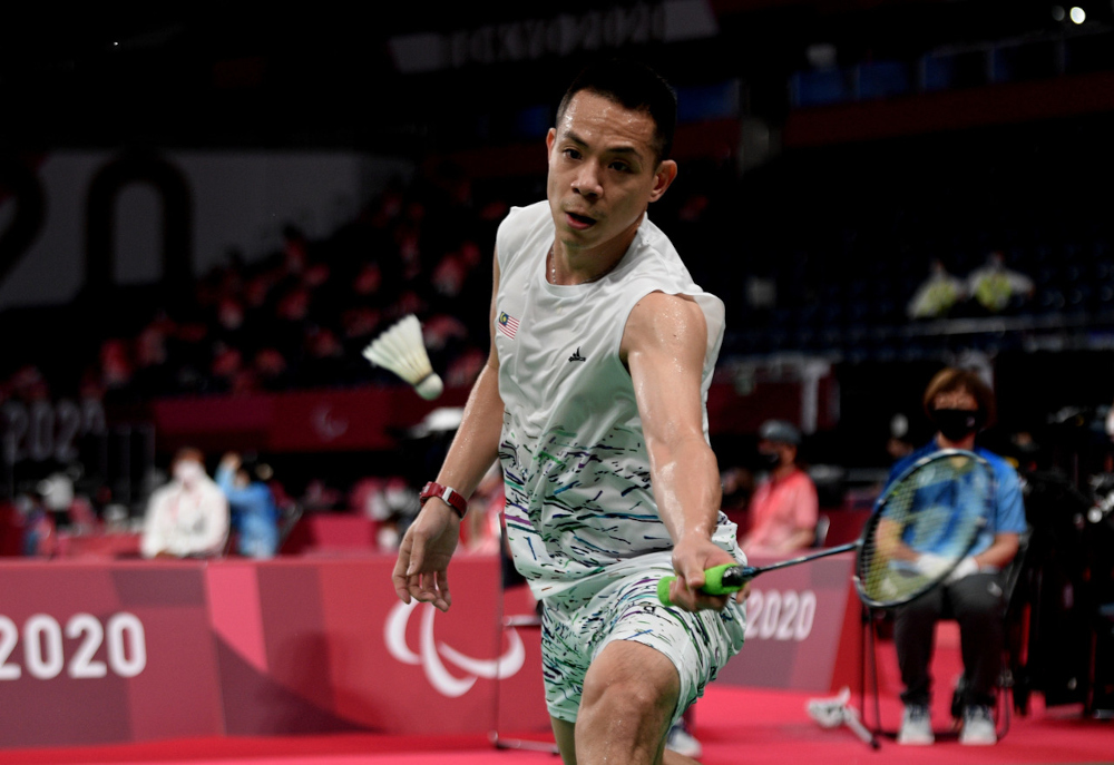 National paralympic badminton athlete Cheah Liek Hou responding to a serve from his opponent Taiwan Fang Jen Yu of the group stage at the Tokyo 2020 Paralympic Games at Yoyogi National Stadium, September 2, 2021. u00e2u20acu201d Bernama picn