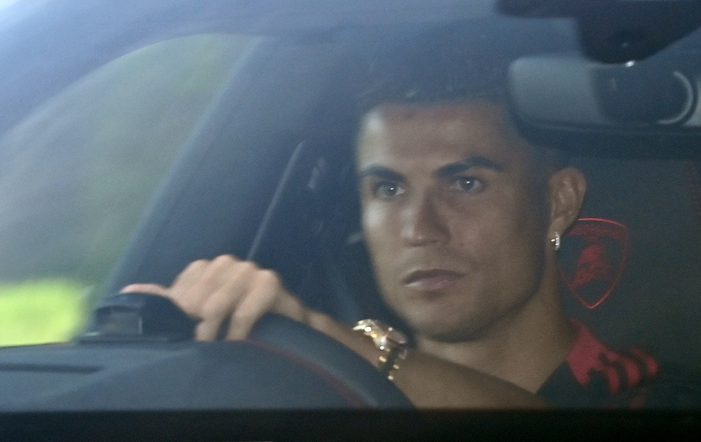 Manchester Unitedu00e2u20acu2122s new signing Cristiano Ronaldo leaves after attending a training session at the Carrington training ground in greater Manchester, north-west England, September 8, 2021. u00e2u20acu201d AFP picnn