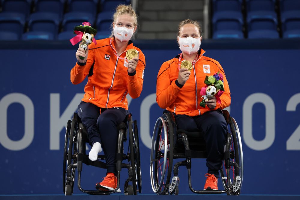 Gold medallists Diede De Groot (left) and Aniek Van Koot of the Netherlands celebrate on the podium at the Ariake Tennis Park, Tokyo September 4, 2021. u00e2u20acu201d Reuters pic