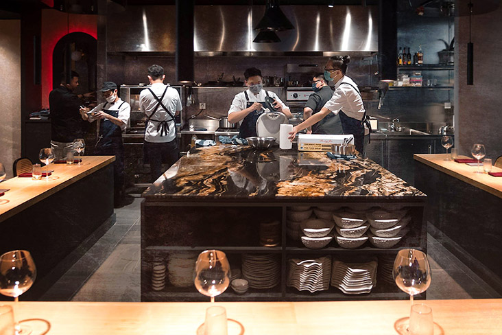 The busy but efficiently run kitchen at Eat and Cook.