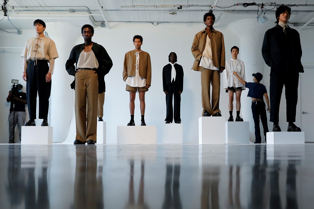 A stylist tends to a model before the presentation of the ONYRMRK Spring/Summer 2022 collection at New York Men's Day during New York Fashion Week in Manhattan, New York September 8, 2021. u00e2u20acu2022 Reuters pic