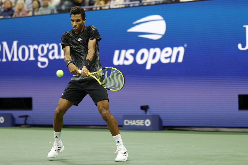 Felix Auger-Alliassime (pic) hits a backhand against Carlos Alcaraz on day nine of the 2021 U.S. Open tennis tournament at USTA Billie Jean King National Tennis Center. u00e2u20acu2022 Geoff Burke-USA TODAY Sports pic via Reuters