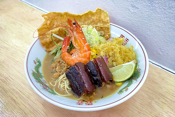 The Fusion Man Ramen features prawns, egg floss, lime and even 'foo chuk' (crispy bean curd skin).