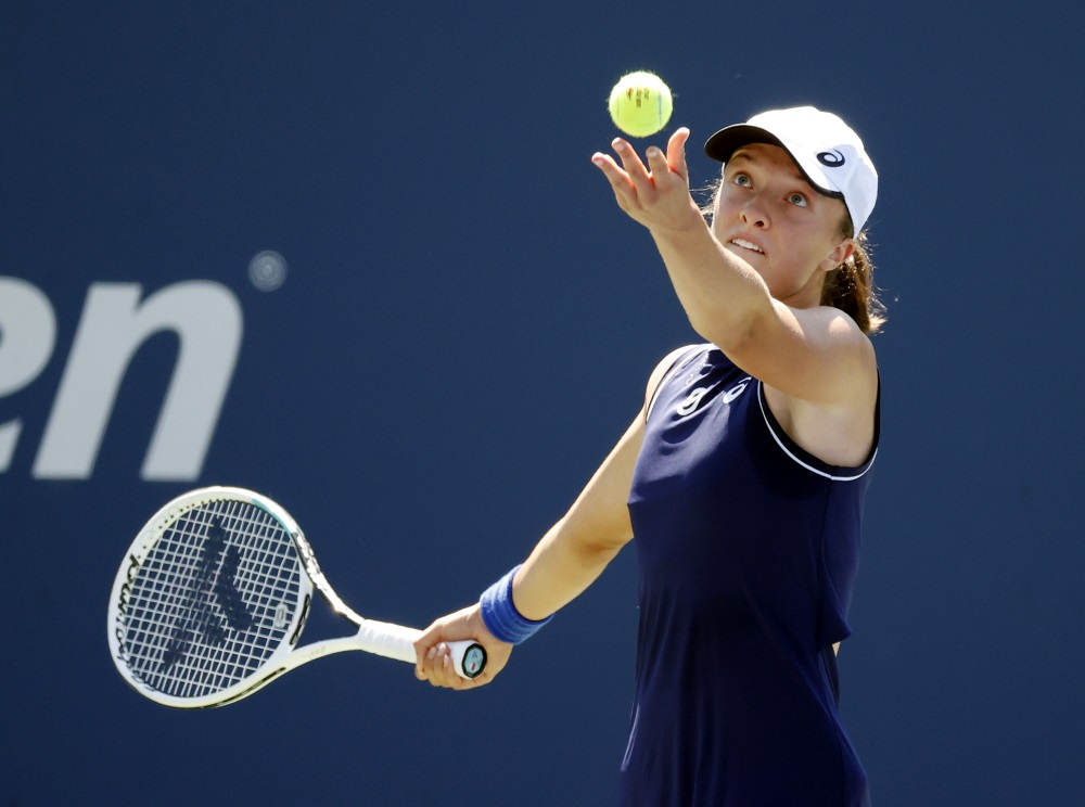 Polandu00e2u20acu2122s Iga Swiatek serves against Fiona Ferro of France in a second round match on day four of the 2021 US Open tennis tournament at USTA Billie Jean King National Tennis Center. u00e2u20acu2022 Jerry Lai-USA TODAY Sports via Reuters