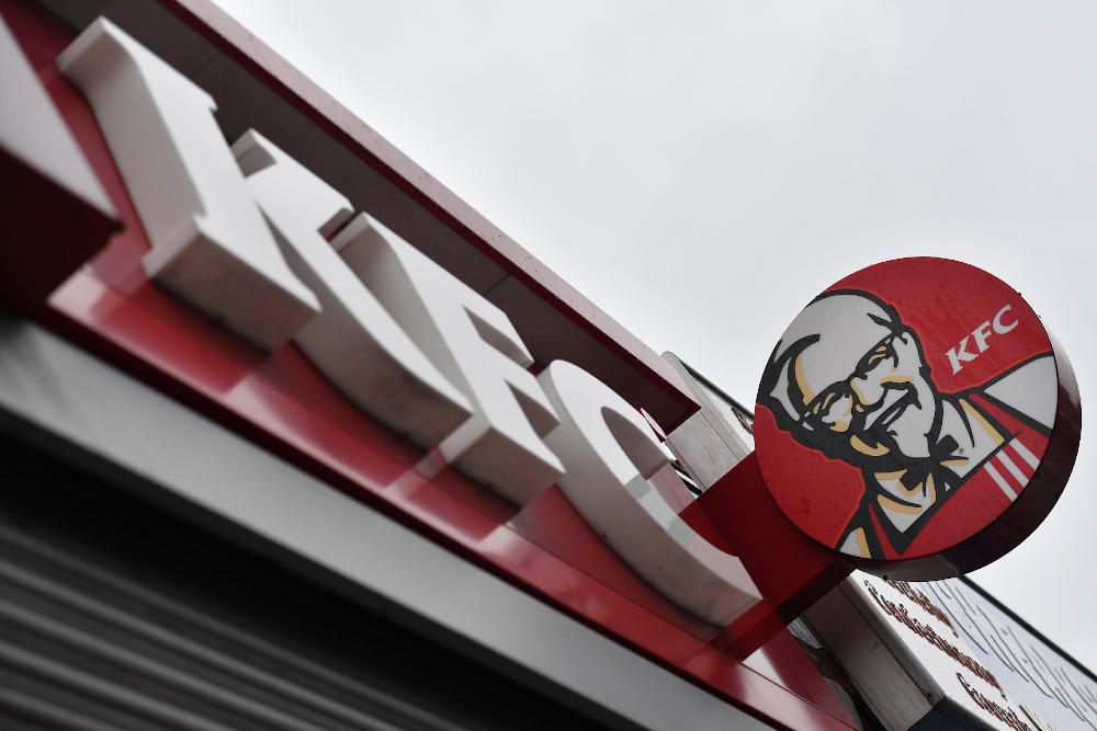 Two gang associates have been nabbed by New Zealand police after they were found trying to enter locked-down Auckland with a trunk full of KFC. u00e2u20acu201d AFP pic