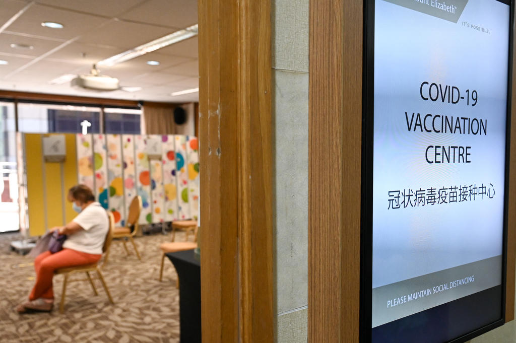 A woman waiting to receive a Covid-19 vaccine at the Mount Elizabeth Hospital vaccination centre. u00e2u20acu201d AFP pic