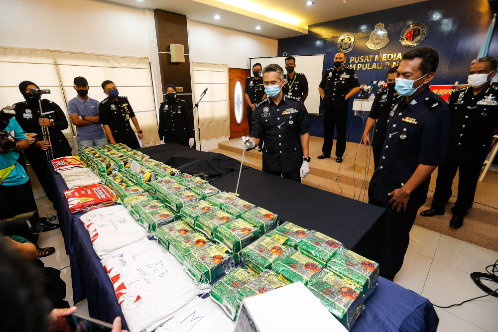 Penang CPO Datuk Mohd Suhaily Mohd Zain (centre) showing the drug seized during the press conference at Penang contingent police headquarters, September 22, 2021. u00e2u20acu201d Picture by Sayuti Zainudin