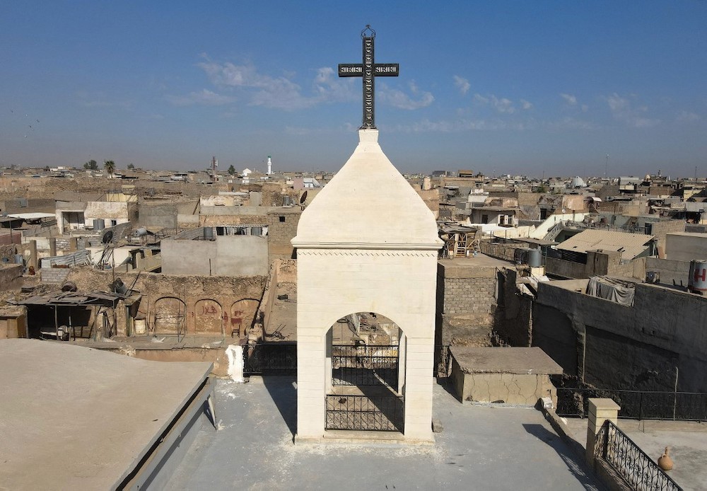 This picture shows the church bell tower of the Syriac Christian church of Mar Tuma in the countryu00e2u20acu2122s second city of Mosul, in the northern Nineveh province, on September 18, 2021. u00e2u20acu201d AFP picnn