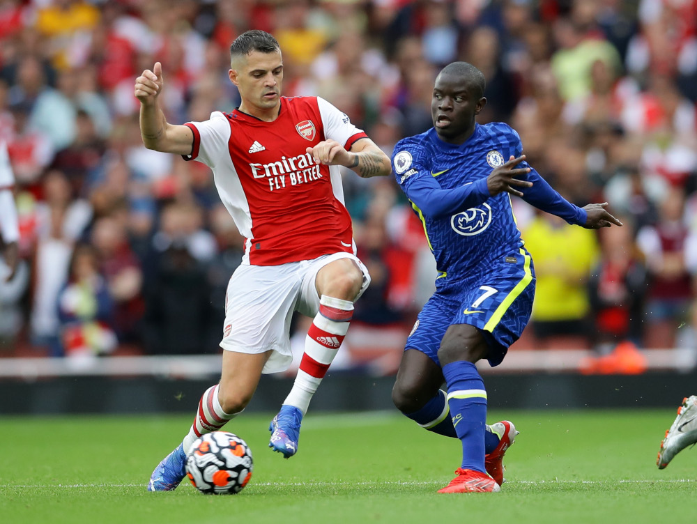 Arsenalu00e2u20acu2122s Granit Xhaka in action with Chelseau00e2u20acu2122s Nu00e2u20acu2122Golo Kante at Emirates Stadium, London, August 22, 2021. u00e2u20acu201d Reuters pic 