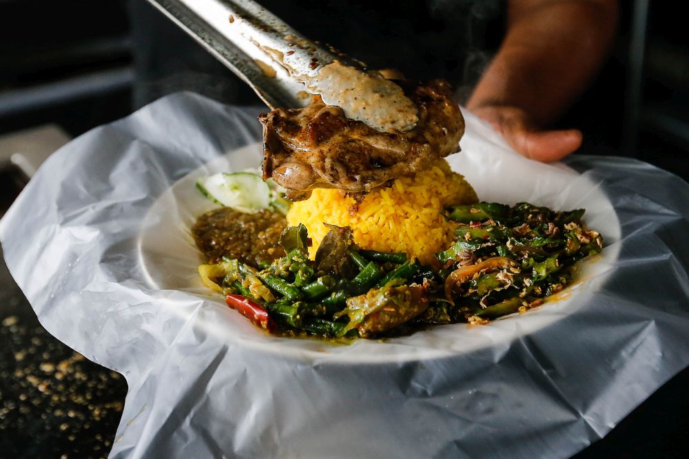 Ayu Yusoff's signature Nasi Ranchak Ayam at the Quallys Nusantara Kitchen on Jalan Burmah, George Town on September 21, 2021. 