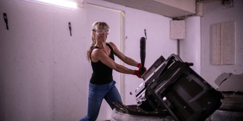 Finlandu00e2u20acu2122s Sanna Sulin, 50, smashes items in the rage room u00e2u20acu02dcRaivomoou00e2u20acu2122 on September 14, 2021 in Helsinki. u00e2u20acu201d ETX Studio picnnn