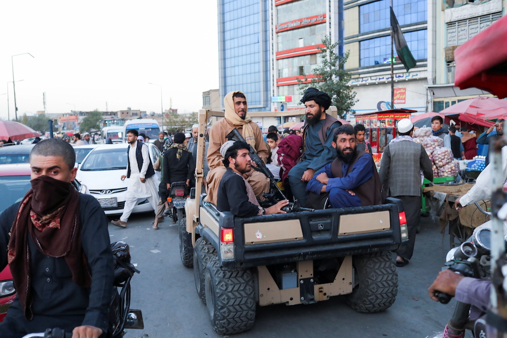 Taliban soldiers sit on the back of a truck in a street in Kabul, Afghanistan, September 16, 2021. Picture taken on September 16, 2021. u00e2u20acu201d Reuters pic