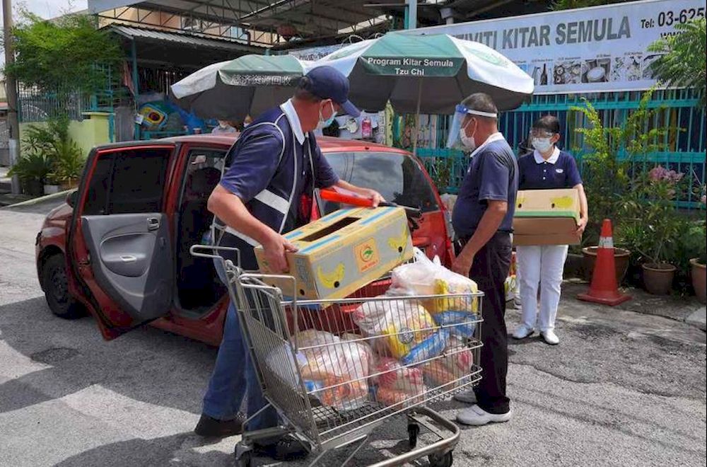 Tzu Chi Kuala Lumpur and Selangor’s volunteers at the Jinjang Recycling Centre in Kepong. — Picture courtesy of Tzu Chi KL and Selangor