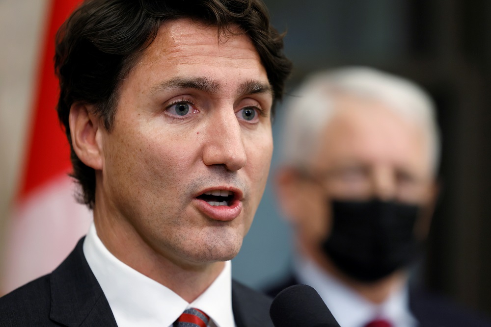 Canada's Prime Minister Justin Trudeau tells reporters that the two Canadian citizens who were detained by Beijing have left Chinese airspace and will arrive back in Canada early today, in Ottawa, Ontario, Canada September 24, 2021. u00e2u20acu2022 Reuters pic