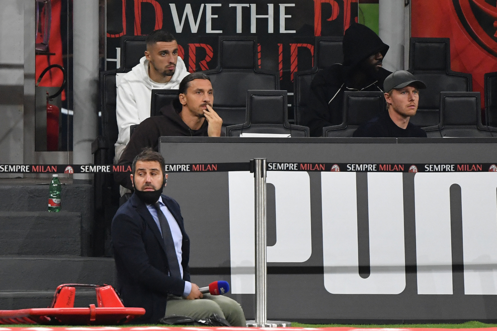 AC Milanu00e2u20acu2122s Swedish forward Zlatan Ibrahimovic watches the Italian Serie A football match between AC Milan and Unione Venezia, September 22, 2021 at the San Siro stadium in Milan. u00e2u20acu201d AFP pic 