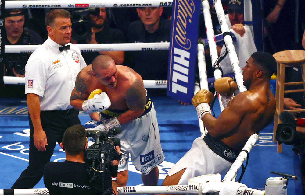 Ukrainian boxer Oleksandr Usyk fights British heavyweight champion boxer Anthony Joshua at the end of their heavyweight boxing match at Tottenham Hotspur Stadium in north London, September 25, 2021. Usyk defeated Joshua on points. u00e2u20acu201d AFP pic 