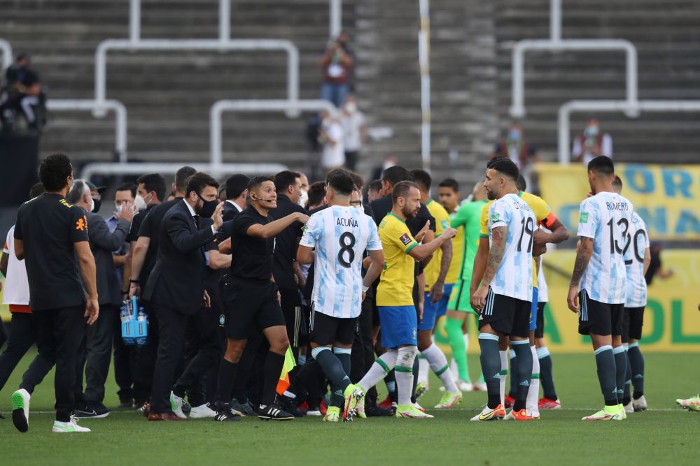 Players and officials are seen on the pitch as play is interrupted between Brazil and Argentina at Arena Corinthians in Sao Paulo September 5, 2021 u00e2u20acu201d Reuters picnn